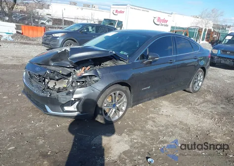 2019 Ford Fusion Hybrid Titanium from USA, damaged, VIN 3FA6P0RU3KR105328